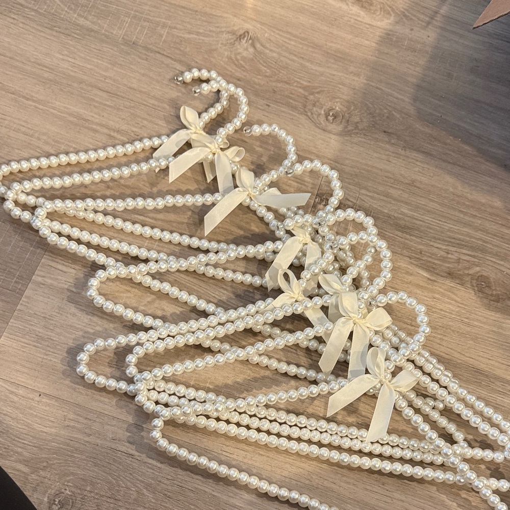 Elegant Pearl Beaded Hangers with Bows